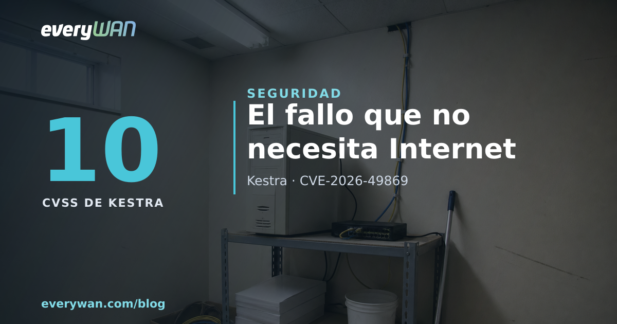 Cuarto de instalaciones de una oficina: un ordenador de sobremesa apoyado en una estantería metálica junto a un conmutador de red pequeño, latiguillos grapados por la pared, una caja de cartón con cables debajo y material de limpieza en la balda de abajo