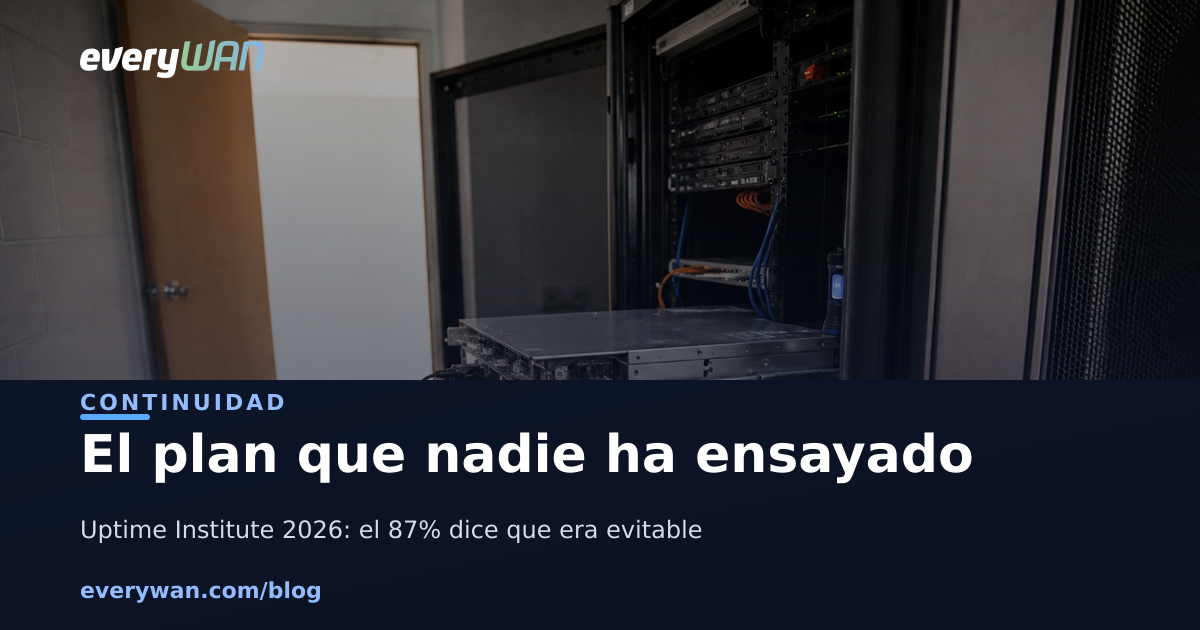 A server room with a machine slid halfway out on its rails and both power cords unplugged and hanging